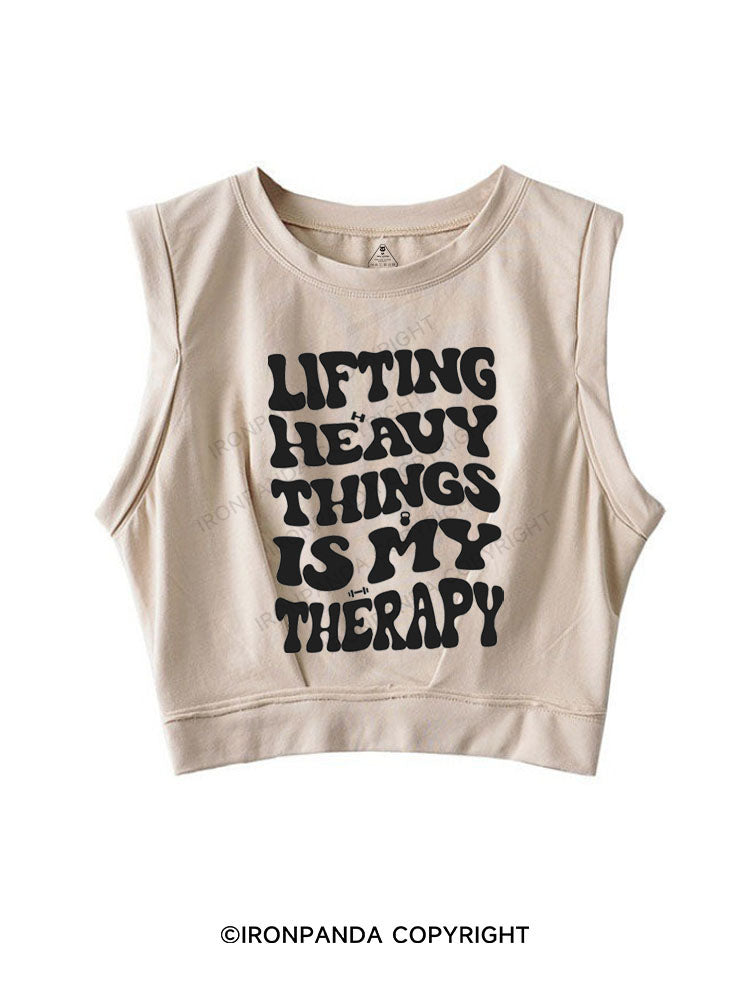 LIFTING HEAVY THINGS IS MY THERAPY SLEEVELESS CROP TOPS