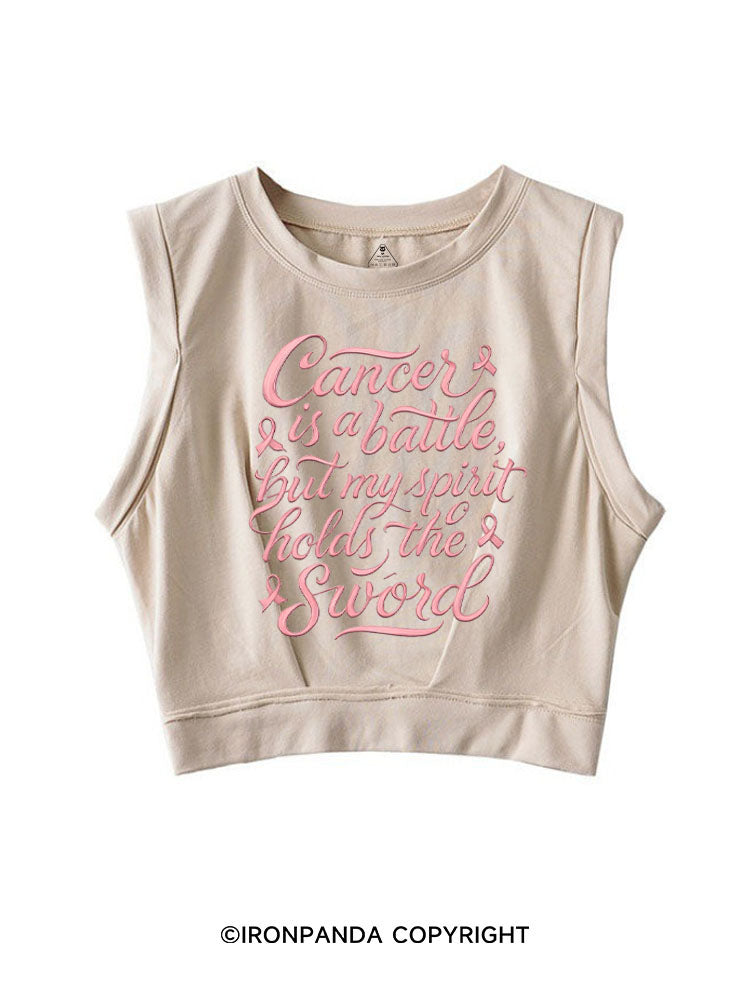 CANCER IS A BATTLE, BUT MY SPIRIT HOLDS THE SWORD SLEEVELESS CROP TOPS