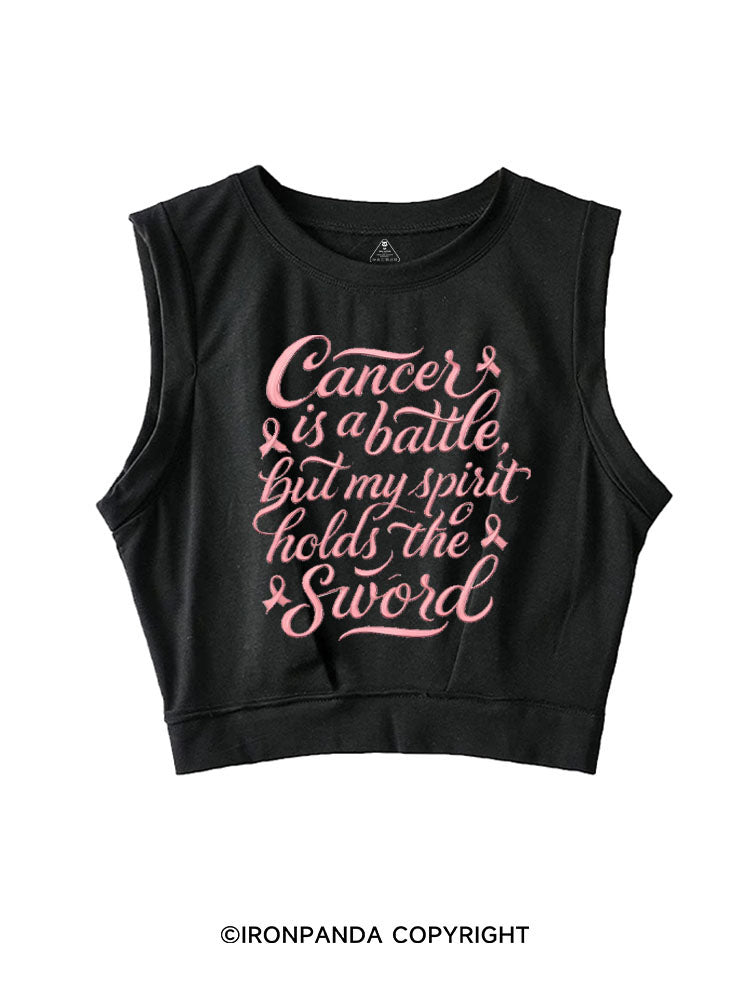 CANCER IS A BATTLE, BUT MY SPIRIT HOLDS THE SWORD SLEEVELESS CROP TOPS